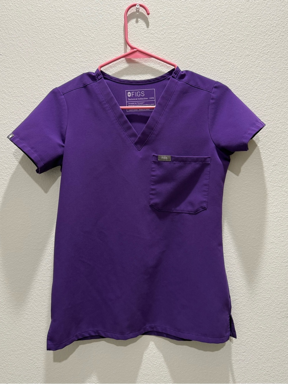 FIGS Women's Catarina one pocket scrub top in digital grape